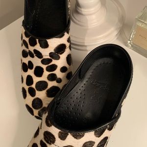 dansko clogs cow print